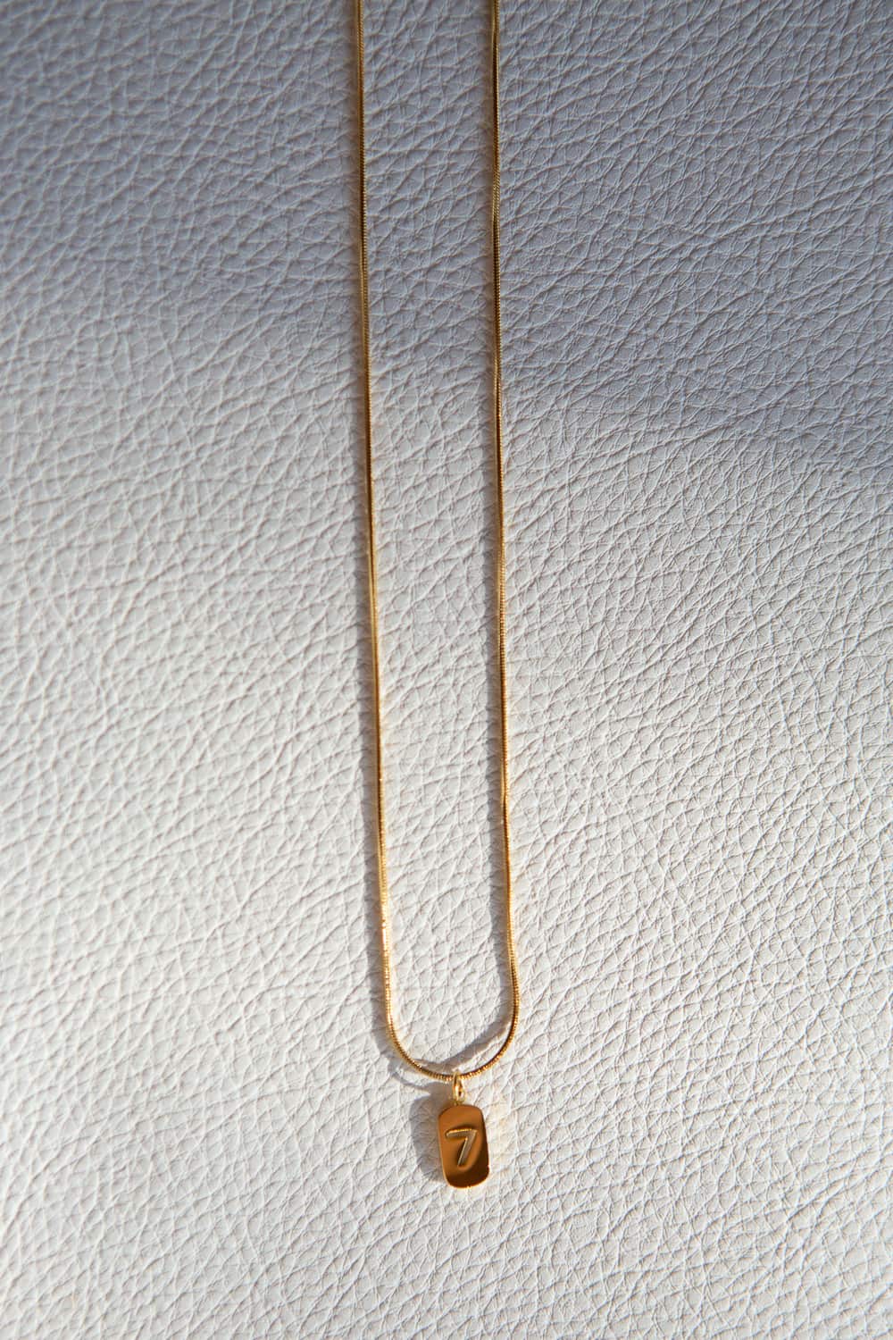 Gold Lucky Number Seven Necklace